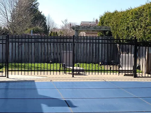metal fence installation around swimming pool